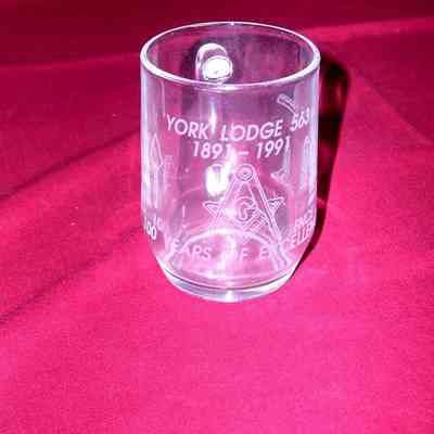 Glass: Celebrating the 100th Anniversary of York Lodge No. 563. Clear with raised lettering.