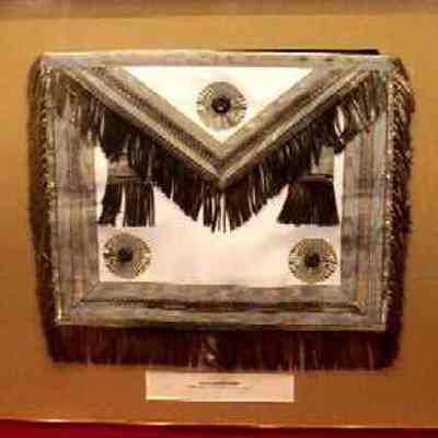 Apron: Irish Masonic apron presented to Ernest Chatterfield of Akron, Ohio. Framed. 15" x 12 1/2", sky blue, white lambskin, silver tassels, blue rosettes