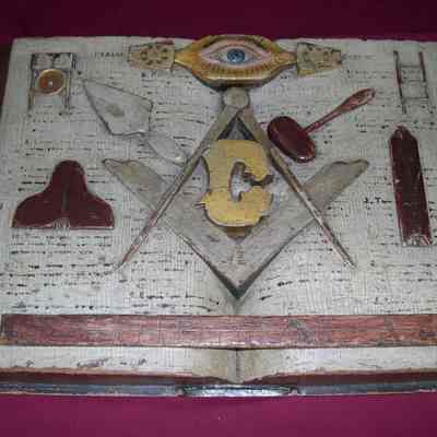 Book: Bible carved from one solid piece of wood by William CLark Cole using only a pocket knife and chisel while stationed at Camp Denision with the Union Army during the Civil War. 22" x 13" x 3" high.