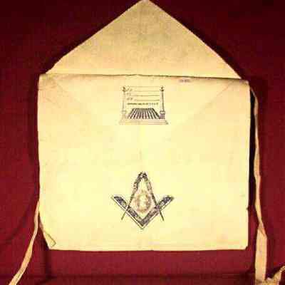 Apron: White leather apron with square and Compasses on body, Eye on flap. No information