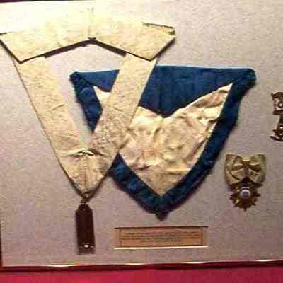 Apron - Apron and leather case. Blue and white Master's apron, black leather apron case. 12" wide blue dorder, white center triangular shape