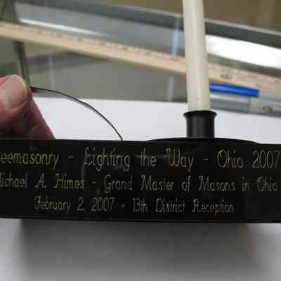 Candleholder: Candleholder box with handle and storage drawer to hold extra candles. Etched in side "Freemasonry - Lighting the Way - Ohio 2007. Michael A. Himes - Grand Master of Masons in Ohio, February 2, 2007 - 13th District Reception"