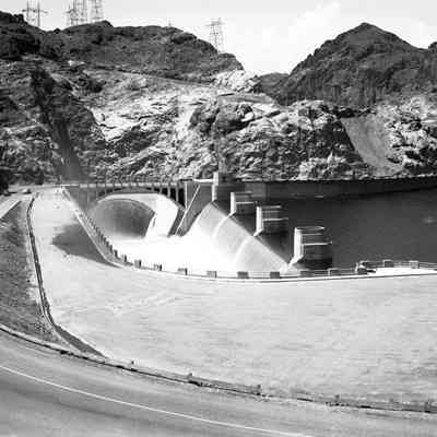 Hoover Dam, water pouring over spillway