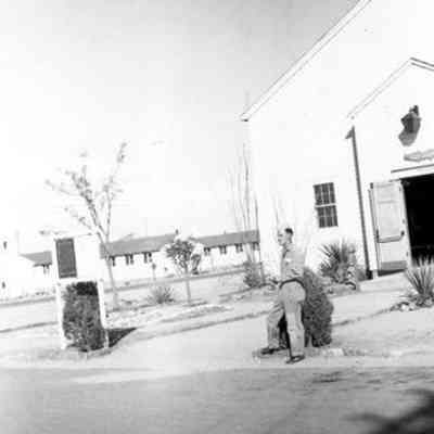 Man in uniform in front of Post Chapel