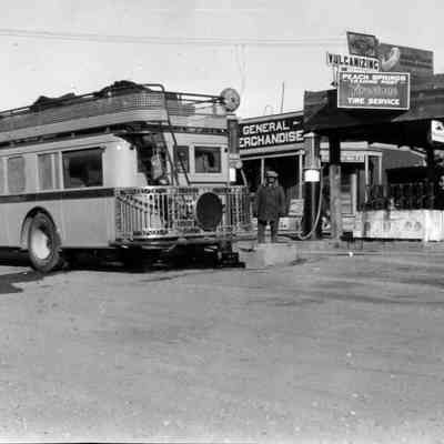 Touring bus in front of station.