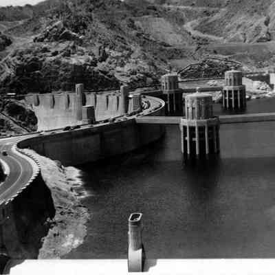 Hoover Dam showing towers, road and lake
