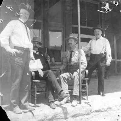 Four men in front of Beale Hotel