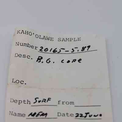 Artifact slip for basaltic glass core: The image shows an artifact slip labeled "Kaho'olawe Sample" with details like number, description, depth, name, and date handwritten.