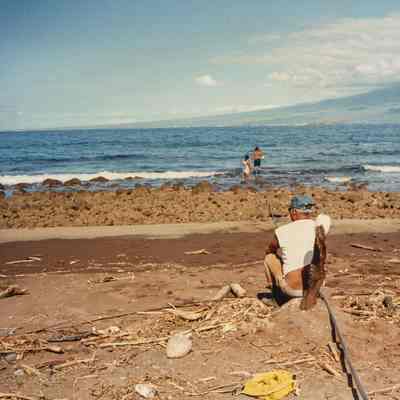 Man sitting on a beach