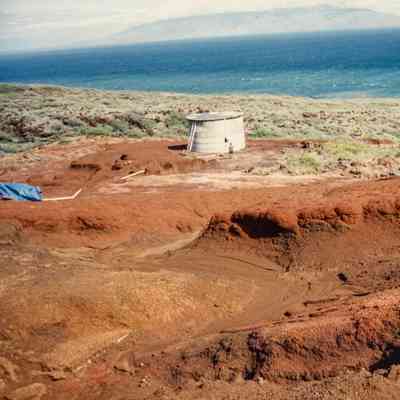 Hardpan terrain and water tank
