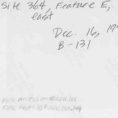 Hand-written text on back of photo (KIRC object id #2011.001.144): The image shows handwritten notes specifying "Site 364, Feature E, looking east," dated December 16, 1978, with reference numbers.