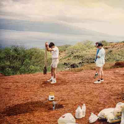 Man digging on hardpan