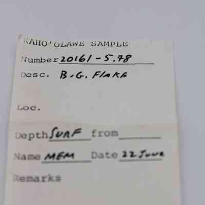 Artifact slip for basaltic glass flake: The image displays an artifact slip labeled "KAHO'OLAWE SAMPLE," detailing a sample number, description, depth, and date.