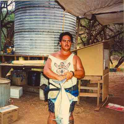 Mark Tsuha holding an 'omilu
