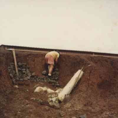 Person working on check dam