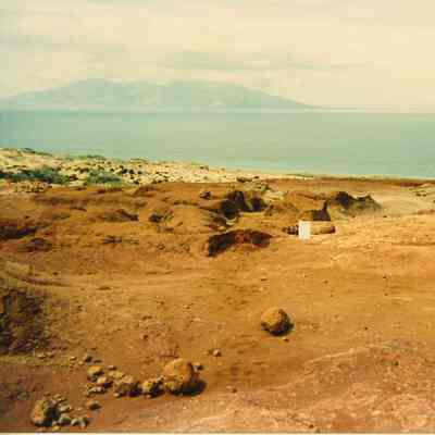Hardpan terrain with white boxes