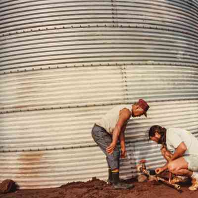 Men working on valve