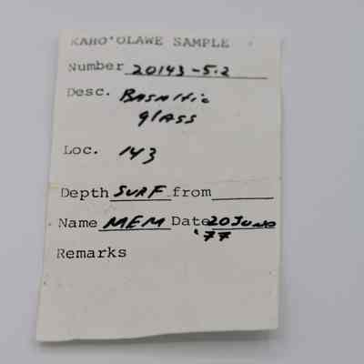 Artifact slip for piece of basaltic glass: The image shows an artifact slip labeled "Kaho'olawe Sample," detailing a basaltic glass specimen numbered 20143-5.2.