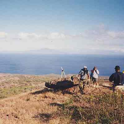 People at Keaweiki Rock (bellstone) and lele at Pu'u 'O Moa'ula Iki