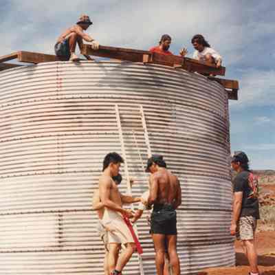 Men working on water catchment structure