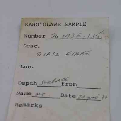Artifact slip for glass flake: The image shows an artifact slip labeled "Kaho'olawe Sample" with a glass flake description, surface depth entry, and a date.