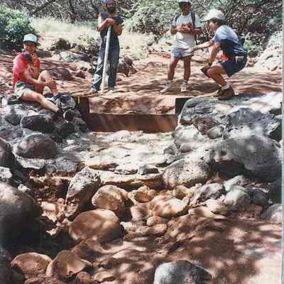 People examining gaging station wier at Hakioawa Stream--access image: Original size: 3.5" x 5"; Original format: Print-Photographic; Resolution: 200 dpi