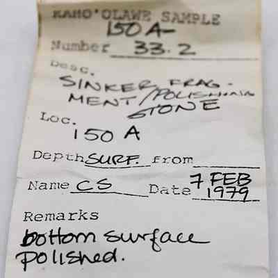 Artifact slip for sinker fragment or polishing stone: The artifact slip documents a sample labeled as "Sinker Fragment/Polishing Stone," located at Site 150 A, dated February 7, 1979.