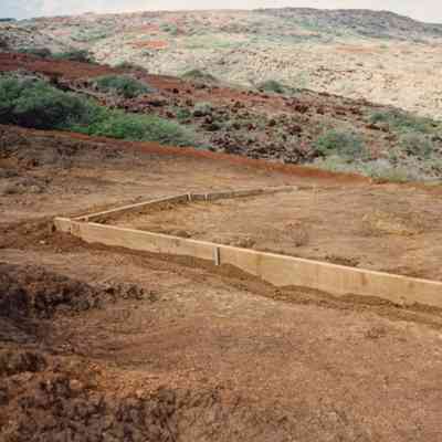 Wooden forms on hardpan terrain