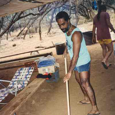 Man raking dirt