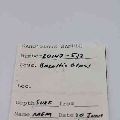 Artifact slip for basaltic glass flake: The image shows a label for a basaltic glass sample from Kaho'olawe, dated June 20, 1977.