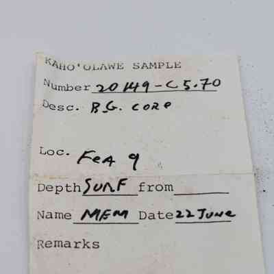 Artifact slip for basaltic glass core: The image shows a label with information about a sample from Kaho'olawe, numbered 20 49-C 5.70, dated 22 June