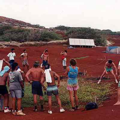 Group of people around a planting