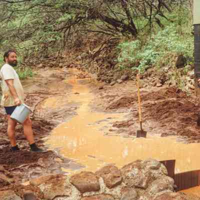 Two men at stream