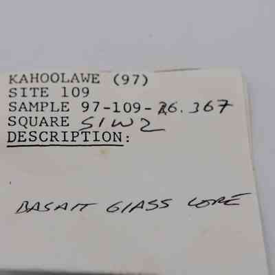Artifact slip for basaltic glass core: The artifact slip indicates information such as the site "KAHOOLAWE," site number "109," sample number "97-109-26."