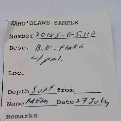 Artifact slip for basaltic glass flake (KIRC Object 2015.006.147): The image shows an artifact slip labeled "Kaho'olawe Sample," including number, description, depth, and date fields, noting surface depth.