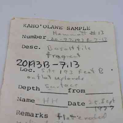 Artifact slip for basaltic file fragment: A handwritten and typed label describes a basalt fragment collected from Kaho'olawe, marked with sample details like location, date, and remarks.