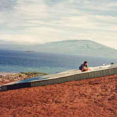 People working on water catchment structure
