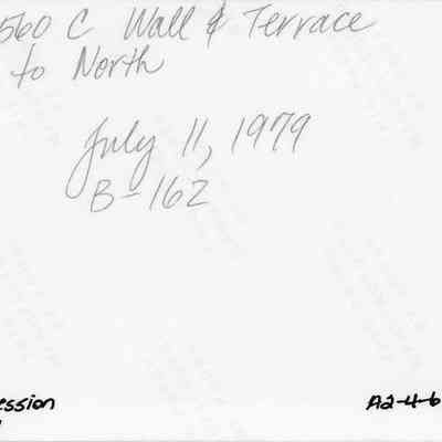 Back of photo of wall & terrace at Site 560 (HaleoPapa): The image shows handwritten text noting "Site 560 C Wall & Terrace to North" and a date "July 11, 1979"