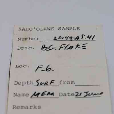 Artifact slip for basaltic glass flake: The image shows an artifact slip labeled "Kaho'olawe Sample" with details including number 20149-A5.41, description "BG flake."