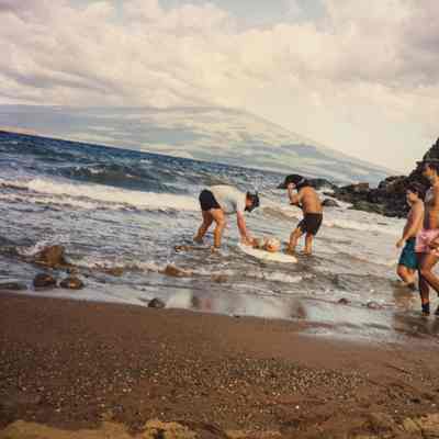 Several men at the beach