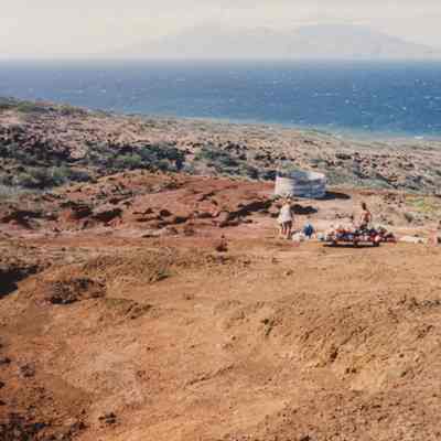 Distant view of people with building materials