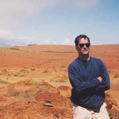 Unidentified man near rocks