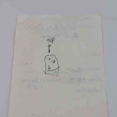 Back of artifact slip for basaltic glass core: The image shows a slip of paper with a rough sketch of an artifact labeled "sp.".