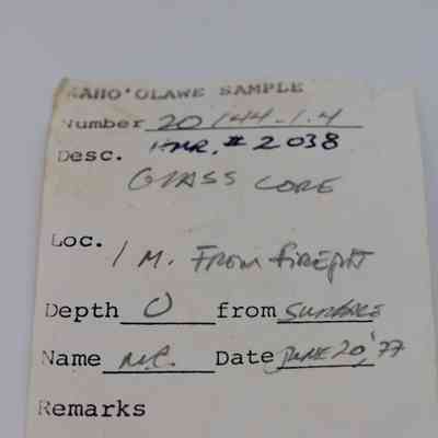 Artifact slip for glass core: The image shows a Kaho’olawe sample slip with handwritten details of glass core collection, including date and location.