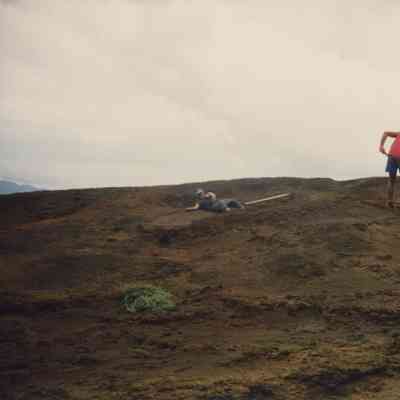 Men on hardpan terrain