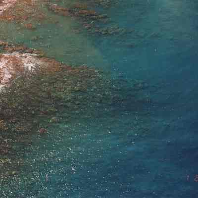 Aerial view of coral beds offshore of Kaukamoku