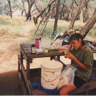 Unidentified person examining first aid kit