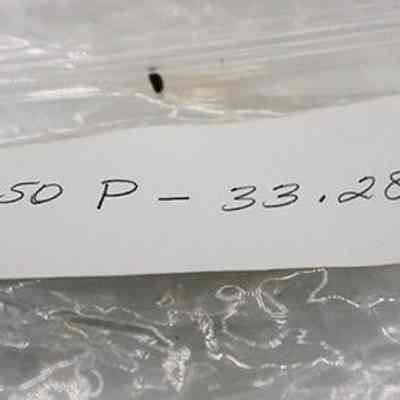 Bag slip for broken cup or mortar: The image shows a clear plastic bag containing a white slip labeled with the numbers "20 150 P - 33.28" in handwriting.