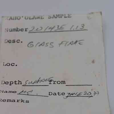 Artifact slip for glass flake: The image shows an artifact slip labeled "Kaho'olawe Sample" with details including a number, description as "glass flake," and date recovered.