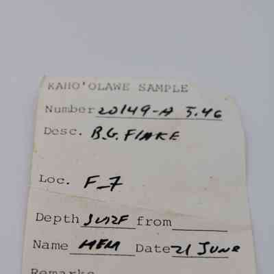 Artifact slip for basaltic glass flake: The image shows an artifact slip labeled "Kaho‘olawe Sample," detailing a sample with number 20149-A, described as "B.G flake."